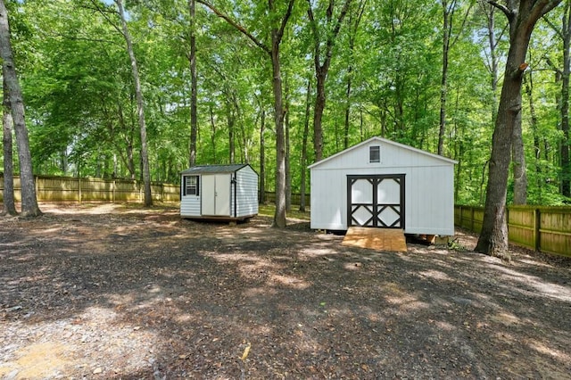 view of shed featuring a fenced backyard