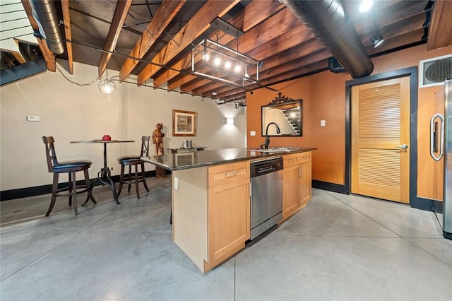 319 Atlanta St SE Unit 315, Marietta, GA 30060 - kitchen with stainless steel dishwasher, a sink, finished concrete floors, and light brown cabinets