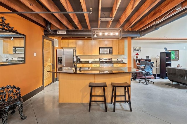 319 Atlanta St SE Unit 315, Marietta, GA 30060 - kitchen with appliances with stainless steel finishes, concrete floors, and dark countertops