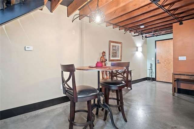 319 Atlanta St SE Unit 315, Marietta, GA 30060 - dining room with finished concrete flooring and baseboards