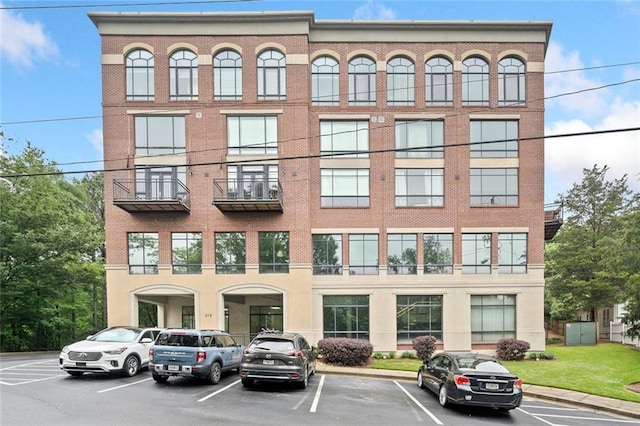 319 Atlanta St SE Unit 315, Marietta, GA 30060 - view of building exterior featuring uncovered parking