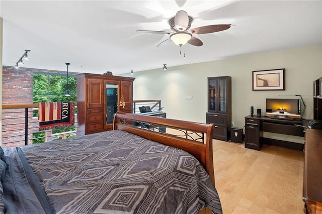319 Atlanta St SE Unit 315, Marietta, GA 30060 - bedroom featuring track lighting, light wood-style floors, and a ceiling fan