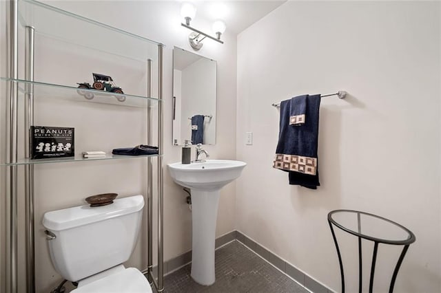 319 Atlanta St SE Unit 315, Marietta, GA 30060 - half bathroom with toilet, tile patterned floors, and baseboards