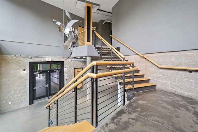 319 Atlanta St SE Unit 315, Marietta, GA 30060 - stairway featuring concrete floors and concrete block wall