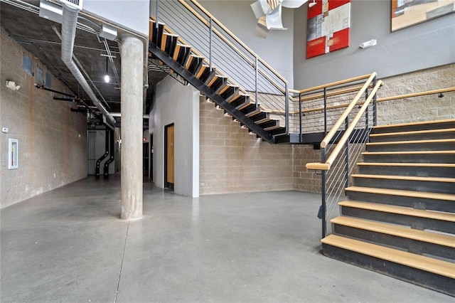 319 Atlanta St SE Unit 315, Marietta, GA 30060 - stairs with concrete flooring and concrete block wall