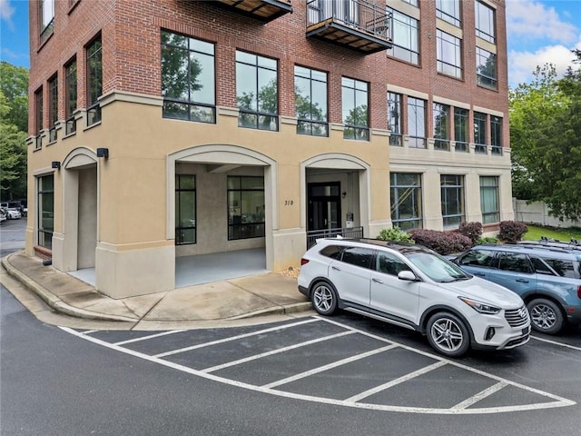 319 Atlanta St SE Unit 315, Marietta, GA 30060 - view of property with uncovered parking
