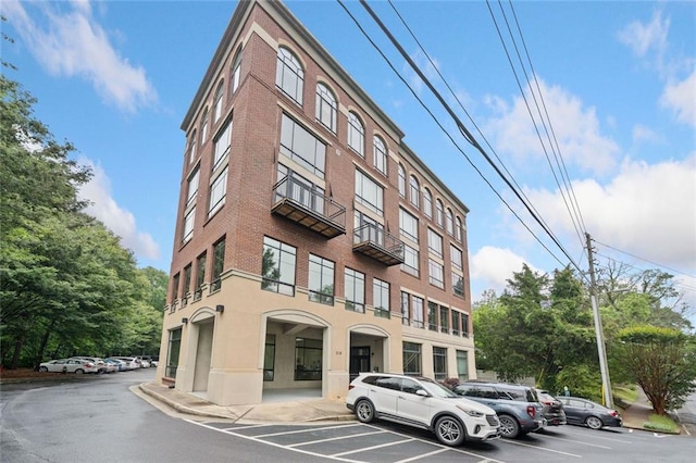 319 Atlanta St SE Unit 315, Marietta, GA 30060 - view of building exterior featuring uncovered parking
