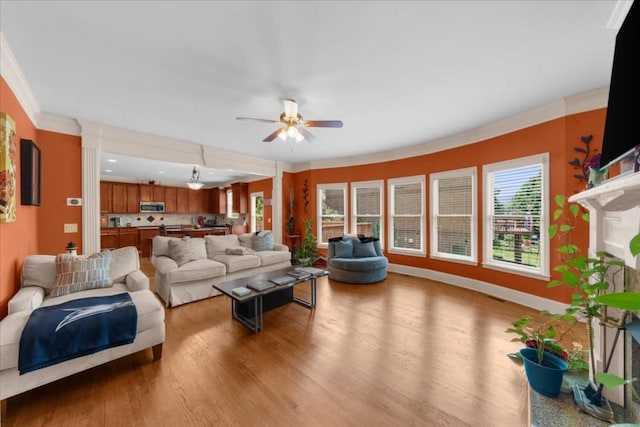 3086 Frazier Walk, Decatur, GA 30033 - living room with ceiling fan, wood finished floors, crown molding, and baseboards