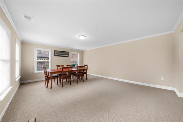 3086 Frazier Walk, Decatur, GA 30033 - dining area with light colored carpet, crown molding, and baseboards