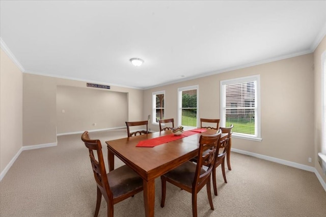 3086 Frazier Walk, Decatur, GA 30033 - dining space featuring ornamental molding, baseboards, and light colored carpet