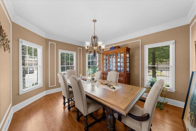3086 Frazier Walk, Decatur, GA 30033 - dining room with a chandelier, light wood-type flooring, baseboards, and ornamental molding