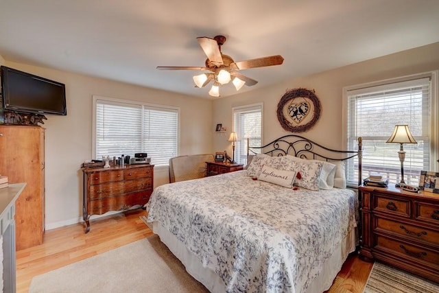 bedroom featuring ceiling fan and light wood-type flooring