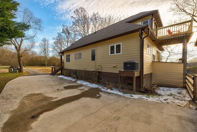 view of home's exterior featuring central AC