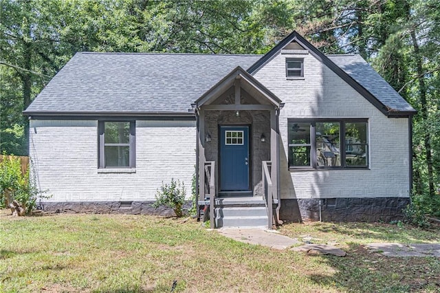 view of front of home with a front yard