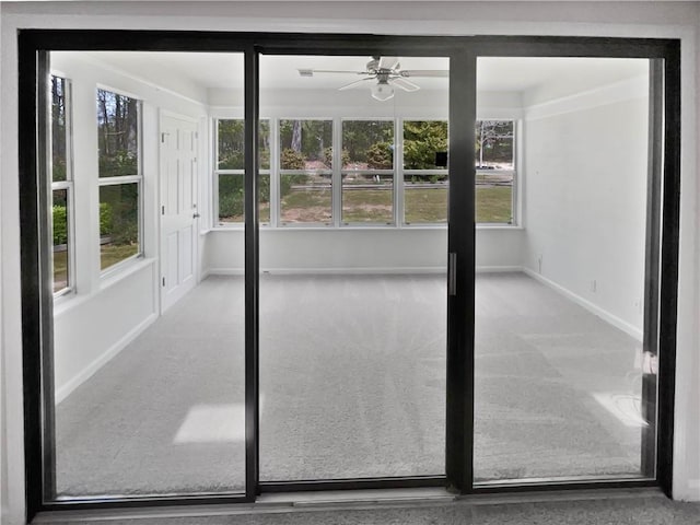 unfurnished sunroom with plenty of natural light