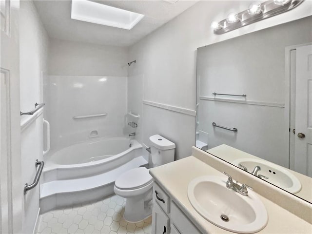 full bath featuring toilet, vanity, tile patterned flooring, and tub / shower combination