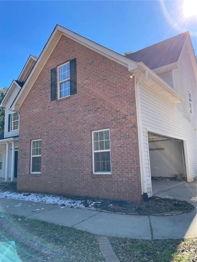 view of side of property featuring a garage