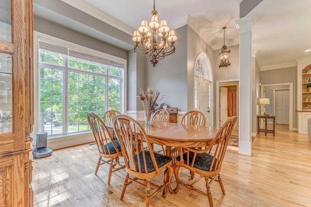 27 Bluff Mountain Dr SW, Rome, GA 30165 - dining area with ornamental molding, a chandelier, and light wood-style flooring
