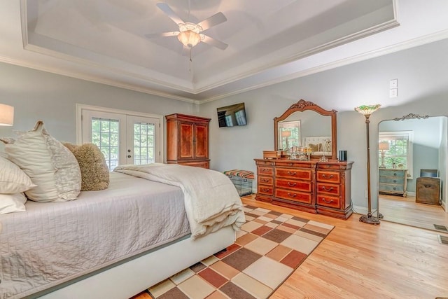 27 Bluff Mountain Dr SW, Rome, GA 30165 - bedroom with a raised ceiling, access to exterior, multiple windows, ornamental molding, and light wood finished floors