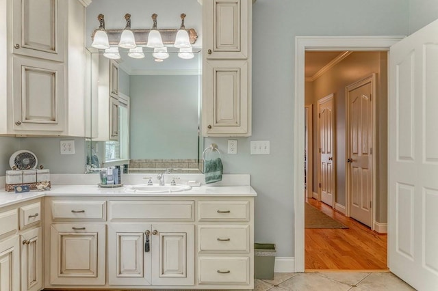 27 Bluff Mountain Dr SW, Rome, GA 30165 - bathroom with crown molding, tile patterned floors, and vanity