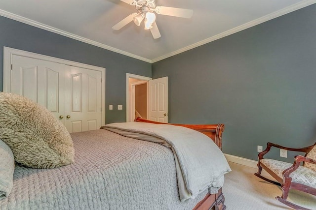 27 Bluff Mountain Dr SW, Rome, GA 30165 - carpeted bedroom featuring ornamental molding, ceiling fan, baseboards, and a closet