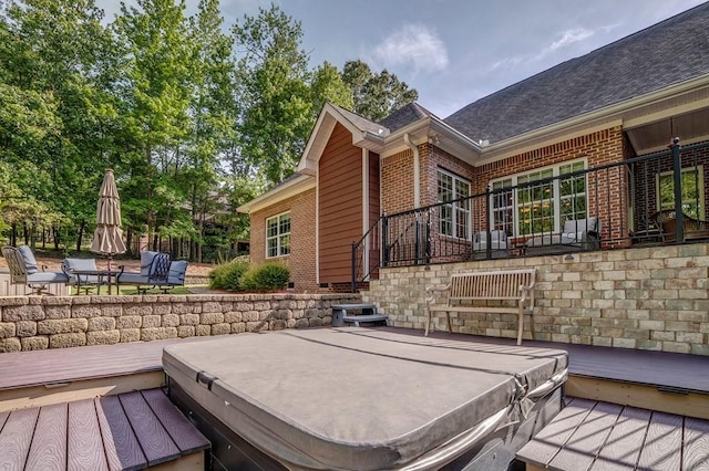 27 Bluff Mountain Dr SW, Rome, GA 30165 - wooden deck with a covered hot tub and a patio area