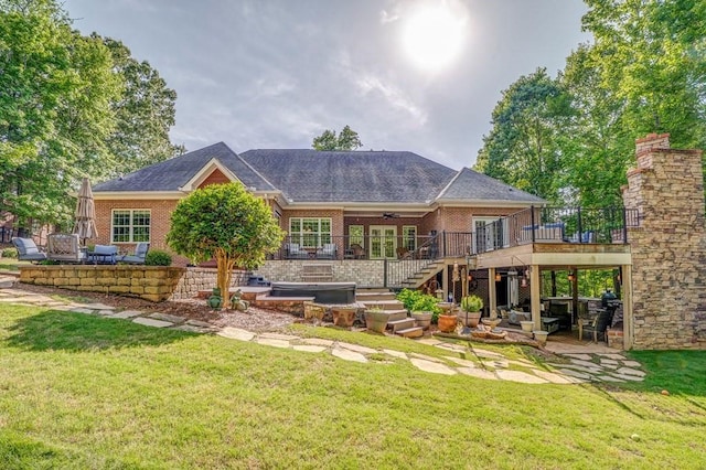27 Bluff Mountain Dr SW, Rome, GA 30165 - back of property featuring a yard, brick siding, a ceiling fan, and a patio