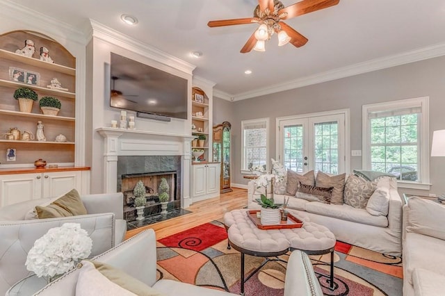 27 Bluff Mountain Dr SW, Rome, GA 30165 - living area with ornamental molding, ceiling fan, light wood-style flooring, a high end fireplace, and recessed lighting