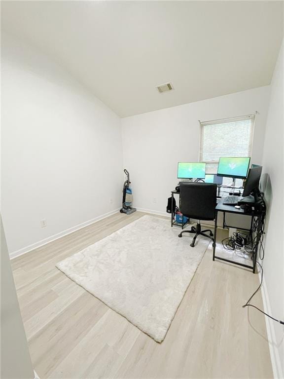 3130 Haynes Park Dr, Lithonia, GA 30038 - office featuring wood finished floors, baseboards, and vaulted ceiling