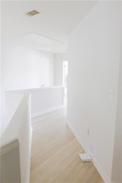 3130 Haynes Park Dr, Lithonia, GA 30038 - hall featuring an upstairs landing, light wood-type flooring, and baseboards