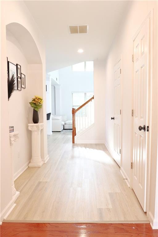 3130 Haynes Park Dr, Lithonia, GA 30038 - corridor featuring light wood-style flooring, baseboards, and stairs