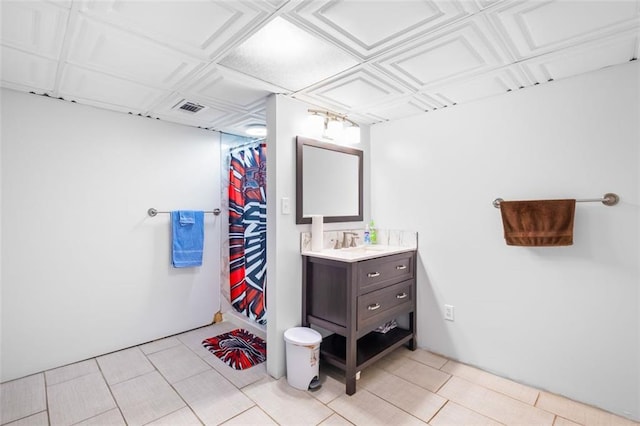 bathroom with vanity and walk in shower