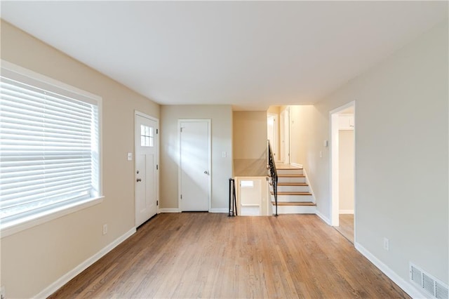 foyer with light wood-type flooring