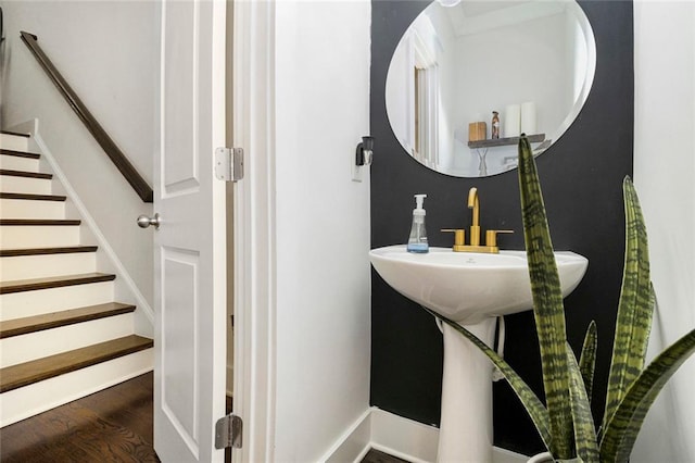 bathroom with hardwood / wood-style floors