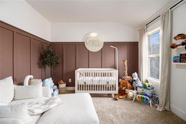 carpeted bedroom featuring vaulted ceiling