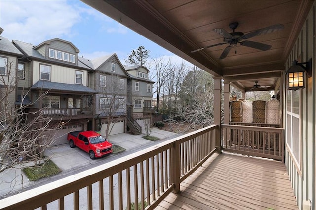 deck featuring covered porch and ceiling fan