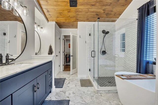 walk in closet featuring wood finished floors