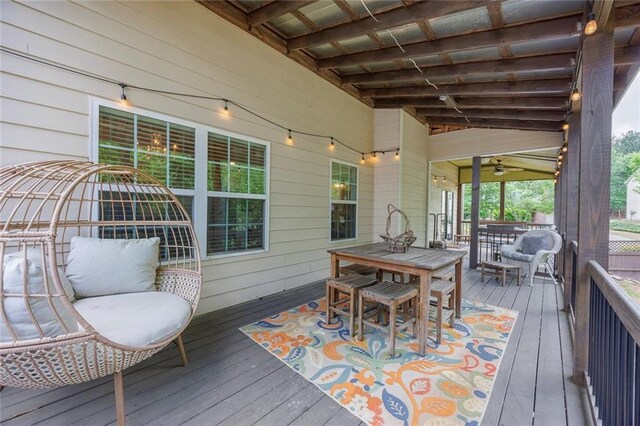 deck featuring outdoor dining area