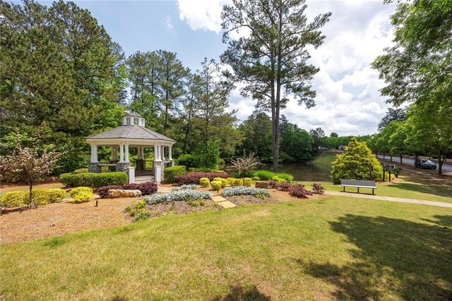 view of community with a gazebo and a lawn