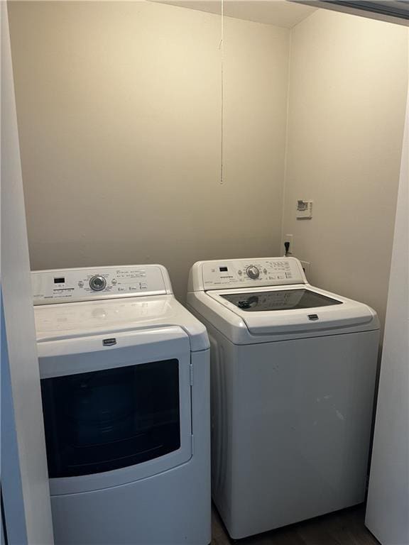 laundry area with laundry area and washer and dryer