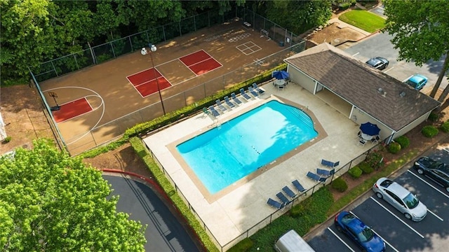 exterior space with community basketball court