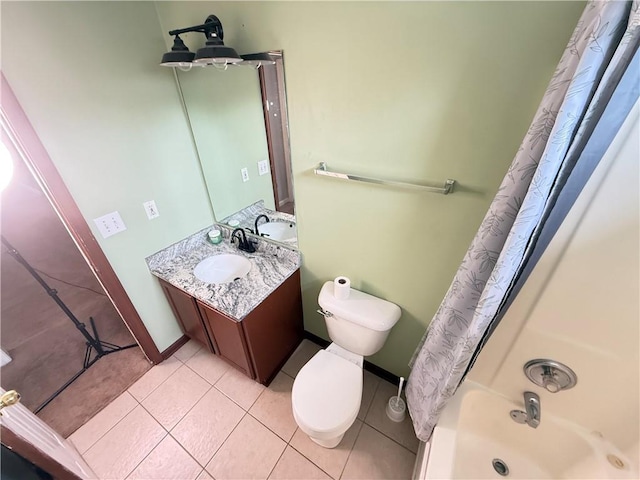 2658 Deann Dr, Ellenwood, GA 30294 - full bath featuring vanity, tile patterned flooring, and shower / bath combo with shower curtain