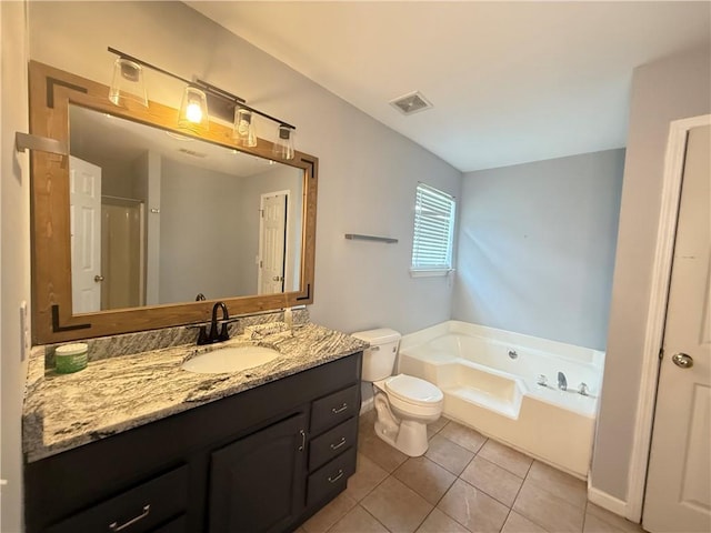 2658 Deann Dr, Ellenwood, GA 30294 - bathroom with a garden tub, vanity, and tile patterned flooring