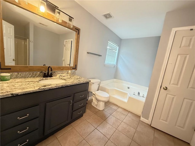 2658 Deann Dr, Ellenwood, GA 30294 - bathroom with vanity, a whirlpool tub, and tile patterned floors