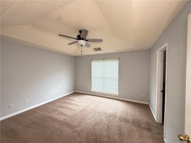 2658 Deann Dr, Ellenwood, GA 30294 - unfurnished room featuring carpet flooring, a ceiling fan, a textured ceiling, and a raised ceiling