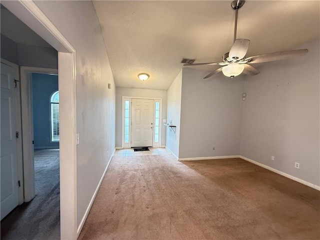 2658 Deann Dr, Ellenwood, GA 30294 - carpeted entrance foyer featuring a ceiling fan and baseboards