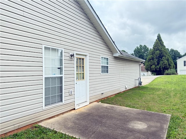 2658 Deann Dr, Ellenwood, GA 30294 - property entrance with a patio area and a lawn