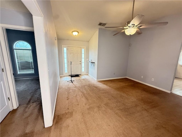 2658 Deann Dr, Ellenwood, GA 30294 - entrance foyer with light colored carpet and ceiling fan
