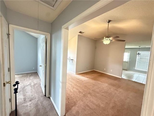 2658 Deann Dr, Ellenwood, GA 30294 - carpeted empty room with attic access, a ceiling fan, and lofted ceiling