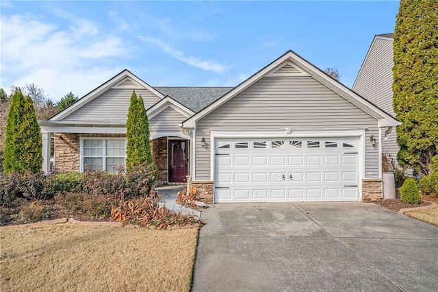 single story home with a garage